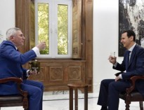 انتقاد بشار اسد از مذاکرات ژنو و تمجید از گفت‌وگوهای آستانه